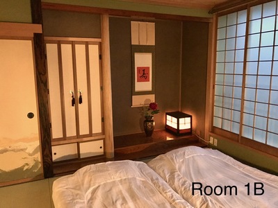 First-floor Japanese-style guest room set up with futon beds